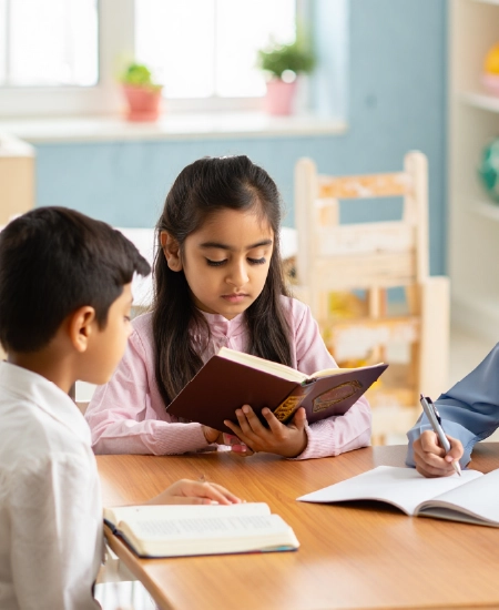 Girl reading religious book