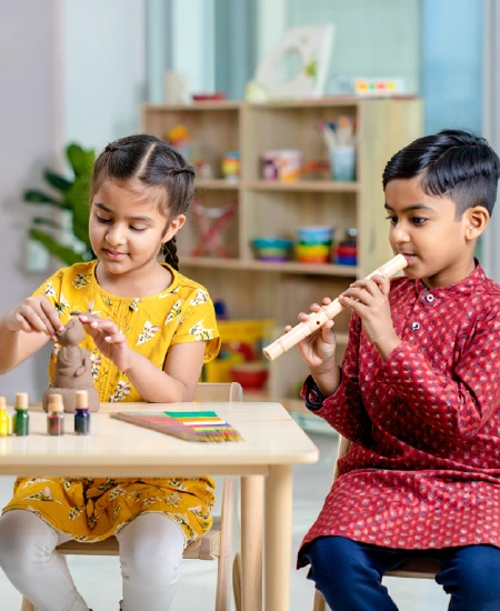 Children playing and sculpting